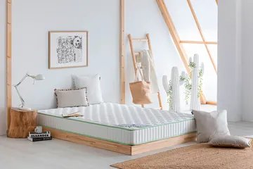 Colchón Ergonomic Sport sobre canapé de madera